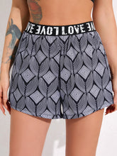 Load image into Gallery viewer, Geo Print Contrast Letter Tape Sports Shorts With Phone Pocket
