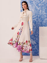 Load image into Gallery viewer, Tie Neck Floral Print Pleated Hem Dress
