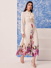 Load image into Gallery viewer, Tie Neck Floral Print Pleated Hem Dress
