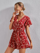 Load image into Gallery viewer, Ditsy Floral Surplice Neck Butterfly Sleeve Romper

